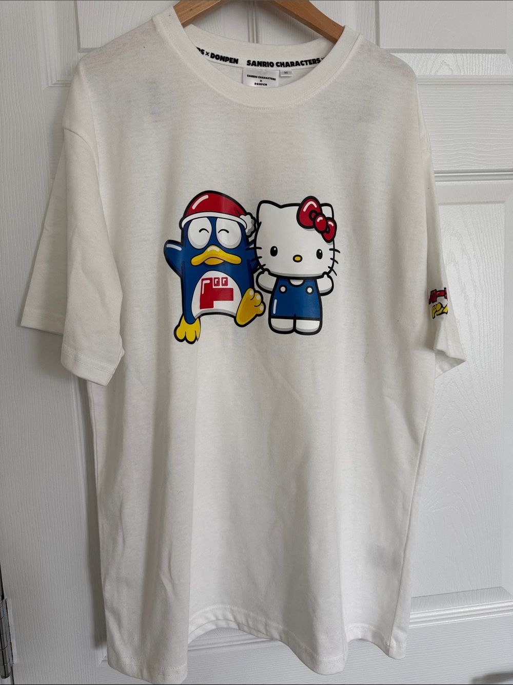 Sanrio White Tee with Hello Kitty & Blue Pochacco Graphic